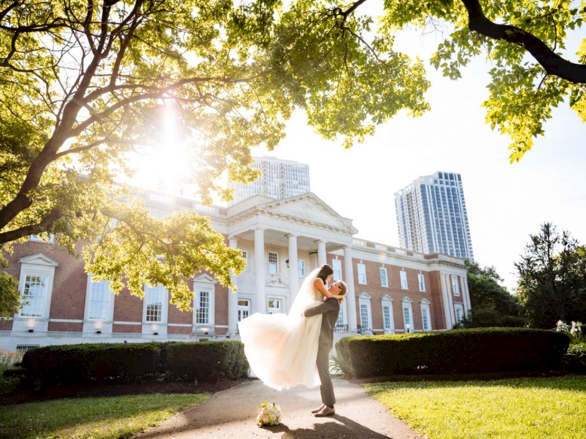 groom holding bride