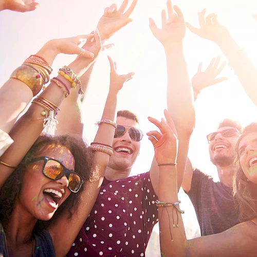 People cheering in a group