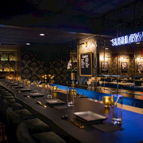 A cozy cafe bar with warm lighting, wooden shelves, and a small stage; stools at the counter and a chalkboard menu in a rustic setting.